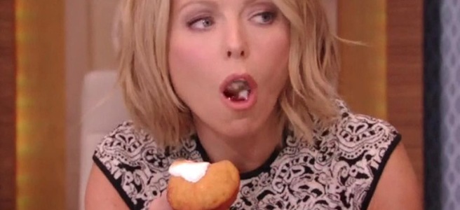 Kelly Ripa tongue kiss.