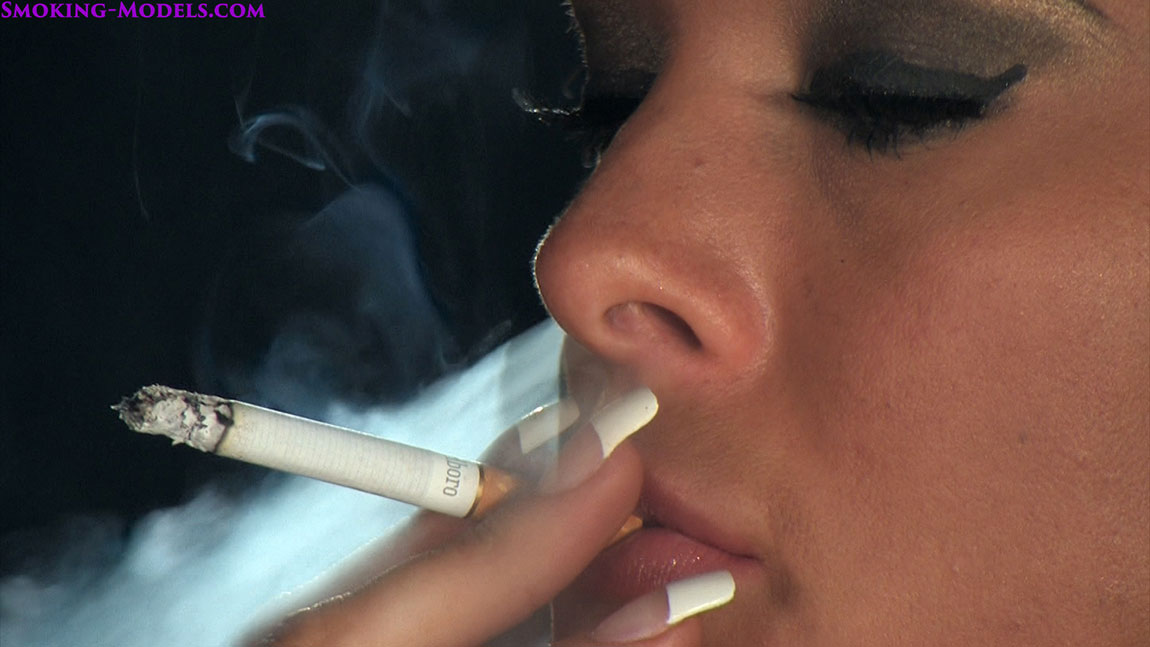 Sasha cane smoking naked while wearing