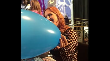 Edyn blair blows giant balloon with