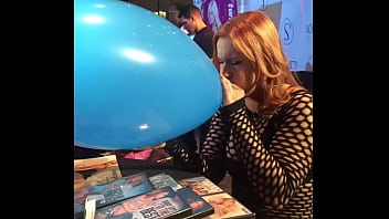 Edyn blair blows giant balloon with